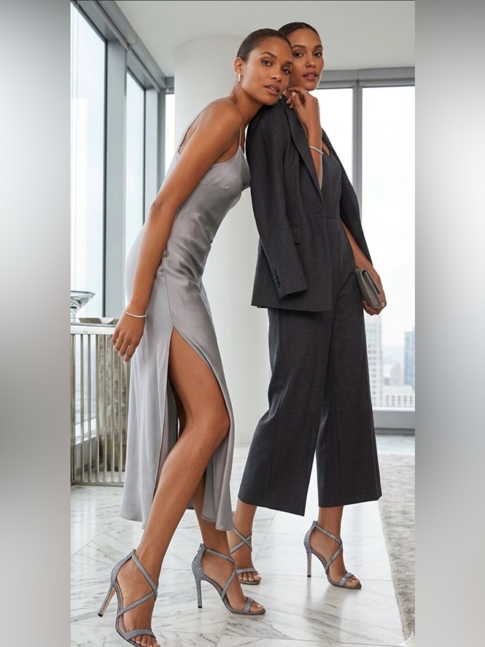 NWT SJP by Sarah Jessica Parker Serpentine Silver sandals with size flaw